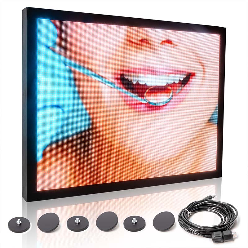 Digital display screen with a dental examination image and a cable on a white background