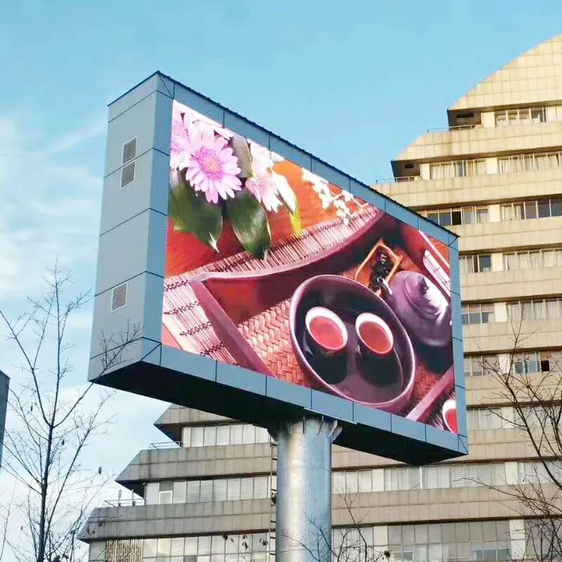 Full-color LED digital display on retail storefront with vibrant graphics - programmable business advertising screen