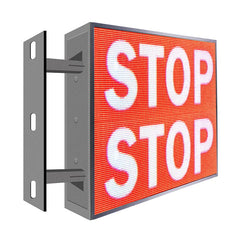 LED sign with 'STOP' text on a white background