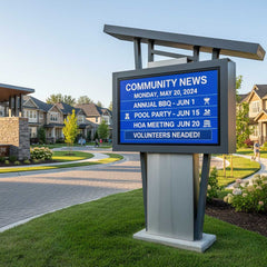 Weatherproof LED display in residential HOA community showing announcements - neighborhood digital message board