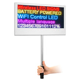 Hand holding a wireless LED sign
