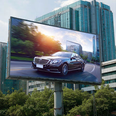 Billboard displaying a car advertisement with a cityscape background