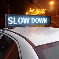 digital sign on top of car