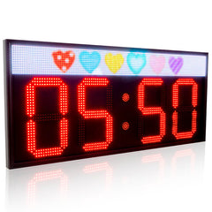 Digital clock with heart-shaped LED lights on a white background