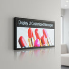 square LED window sign with black metal frame displaying vibrant colorful content