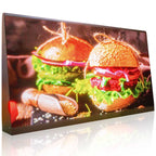 LED display screen showing a digital image of a burger with flames