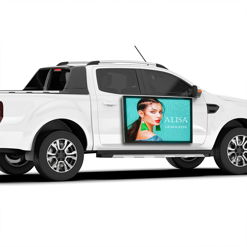 White pickup truck with a digital display showing a woman's face and 'ALISA' branding.