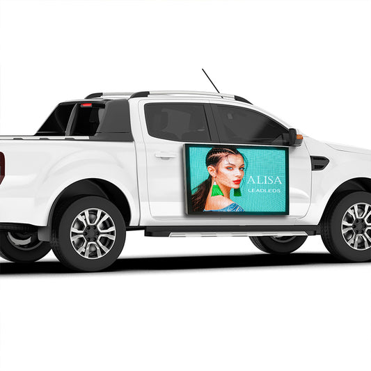White pickup truck with a digital display showing a woman's face and 'ALISA' branding.