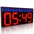 Digital clock with 'Embrace the Journey' text on a white background