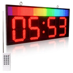 LED digital clock with remote control on a white background