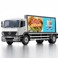 WiFi programmable LED mobile advertising screen on delivery truck at outdoor dining area - digital signage solution