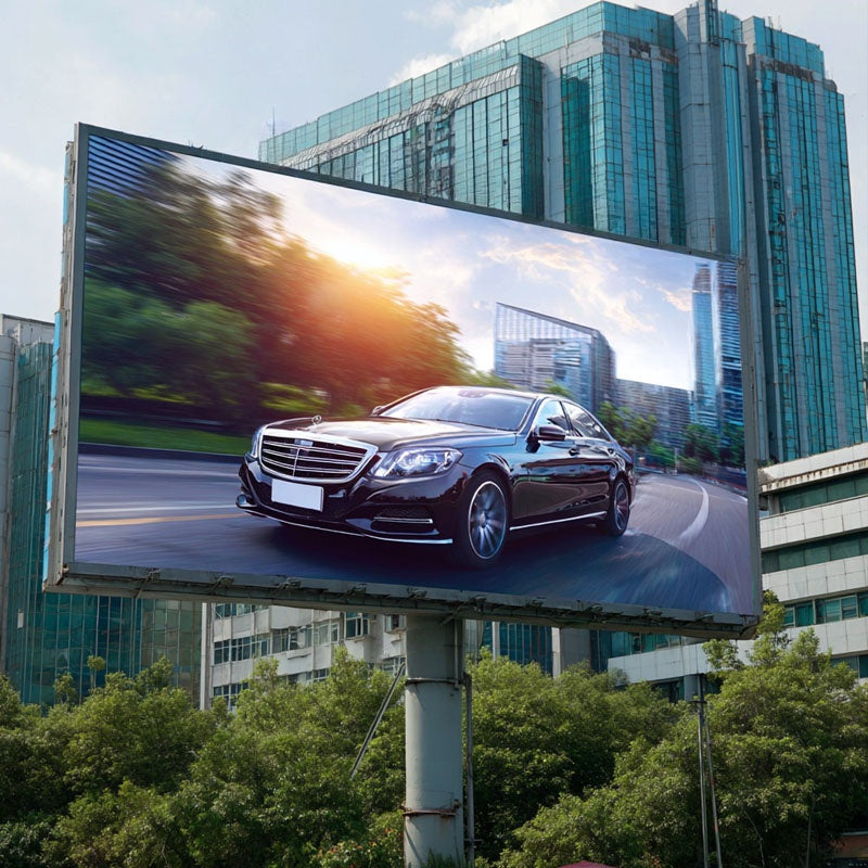 Billboard displaying a car advertisement with a cityscape background