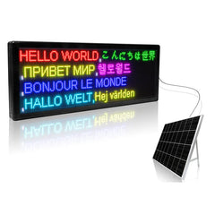 LED display board with multiple language texts next to a solar panel