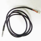 Thermocouple with black cable on a white background
