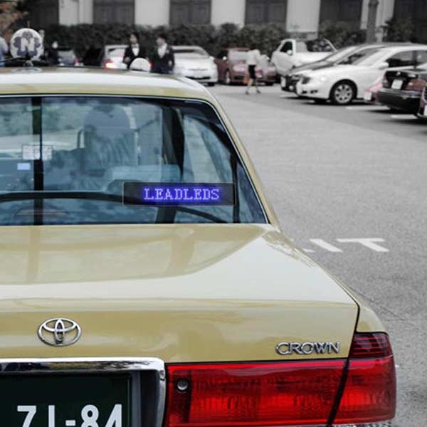 Blue LED scrolling message display panel for vehicle rear window powered by 12V car adapter
